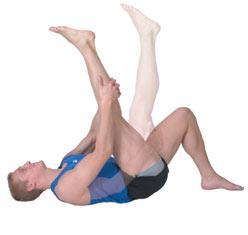 Lie comfortably on your back, concentrating on keeping both your head and buttocks in contact with the floor. 2.