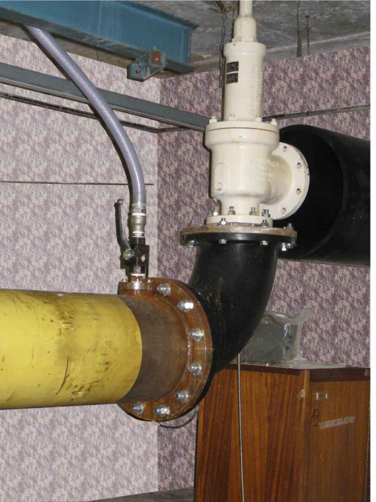 Figure 3. Relief valve (N) located at end of the water filled tube, also showing water outlet used for water filling and valve air bleed leg.