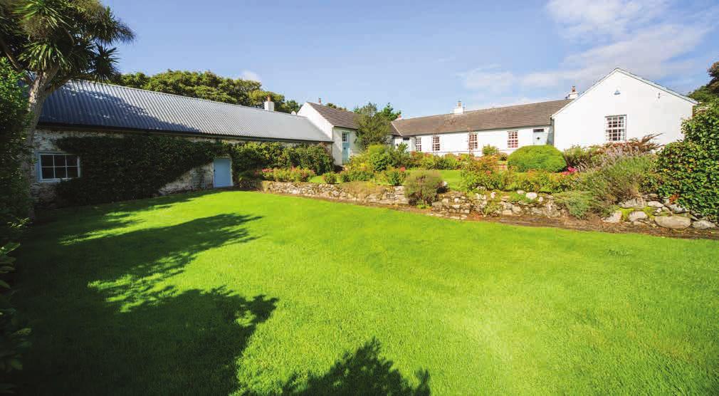 GARRAUNBAUN LODGE, MOYARD, CLIFDEN, COUNTY GALWAY, IRELAND A MAGNIFICENTLY SECLUDED 4 BEDROOM HOME APPROX. 300 SQ.M / 3,230 SQ.FT IN A MAJESTIC SETTING ON APPROX.