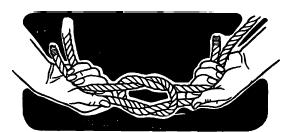 Hold one end of the rope in each hand.