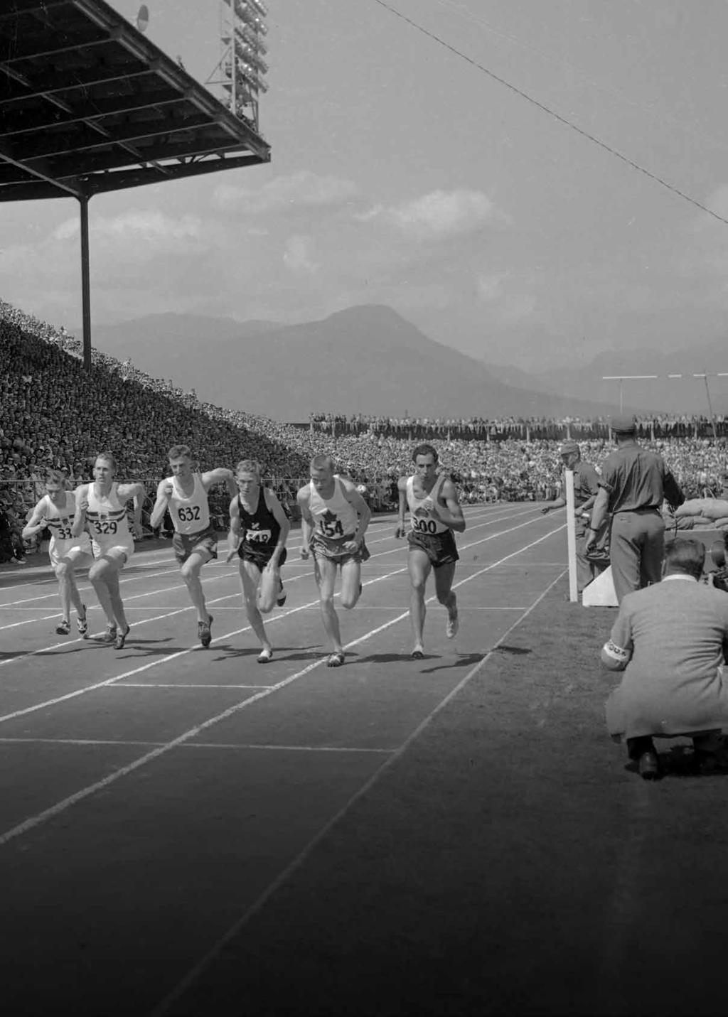 John Landy (No.300) and Roger Bannister (No.329) compete in the Miracle Mile race during the 1954 British Empire and Commonwealth Games in Vancouver. over 6,600 athletes and team officials.