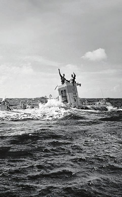 The Trieste, in 196, surfaces after reaching the record depth of 1,916 metres (35,814 feet) in the Pacific Ocean, with an experimental Rolex watch attached to its hull.
