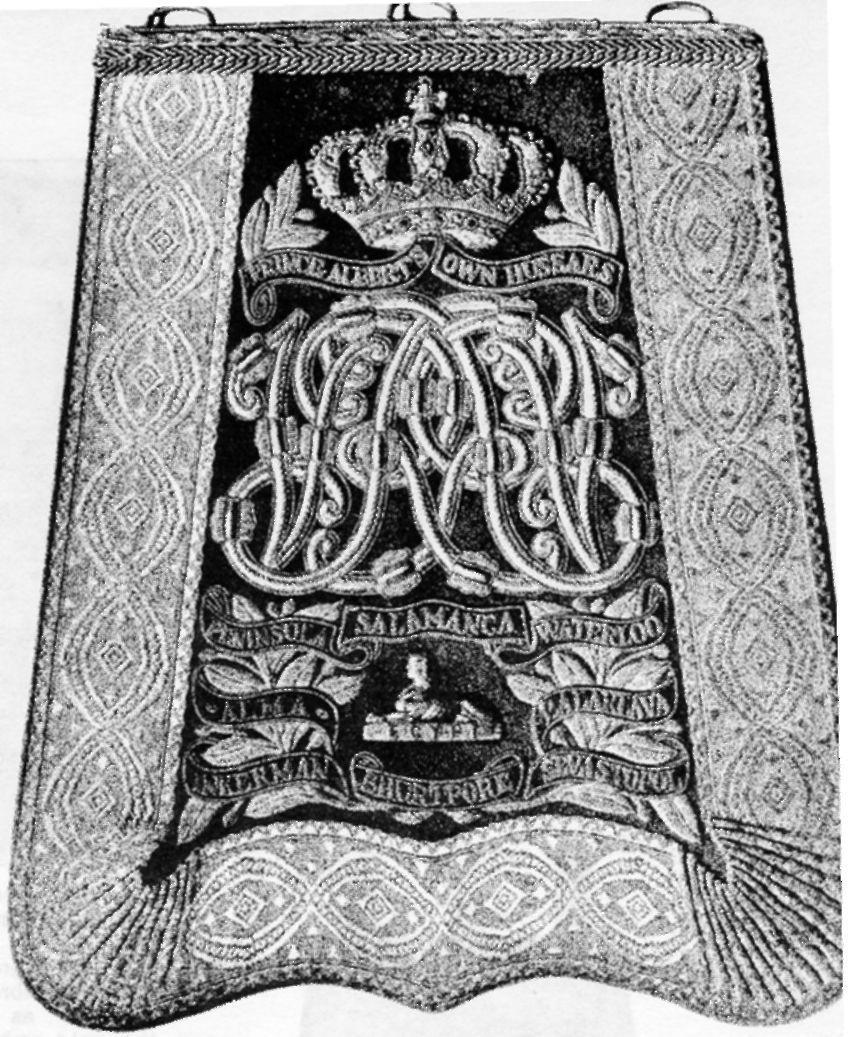 and very shortly the structural quality, elegance and beauty, and consequently the expense, of officers' sabretaches laced, embroidered with monograms, battle-honours, mottoes and insignia of one