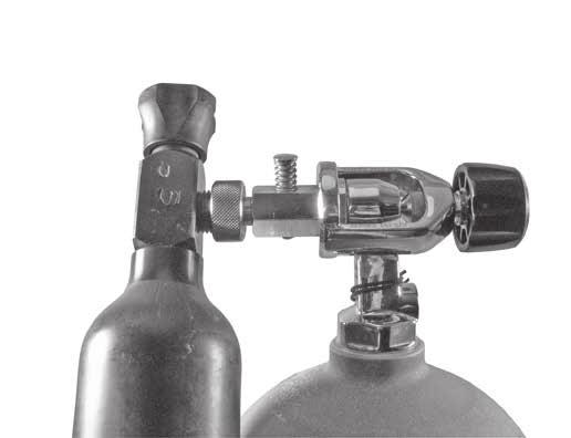 11 5. While supporting the auxiliary air cylinder with one hand, place the yoke of the fill adapter over the cylinder valve to align the inlet fitting flush against the valve o-ring.
