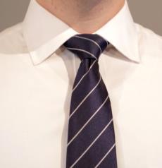 It is made for sleek, tall, thinner and fit men! It produces a neat looking triangular knot.