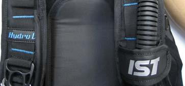 19] is located on the other side of the carrying handle (back of the BCD).