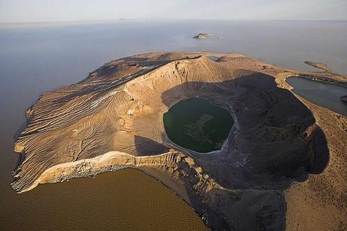 Worldwide salt lakes Lake Turkana Kenya and Ethiopia Surrounded by barren volcanic beds.