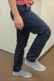 Hip Flexion: Lift your surgical leg in the air by flexing at the hip and knee.