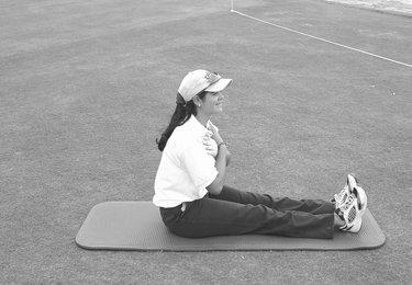 angle, keeping knees positioned over foot and maintaining balance. Any deviations in right and left weight bearing and loading of the extremities should also be noted.