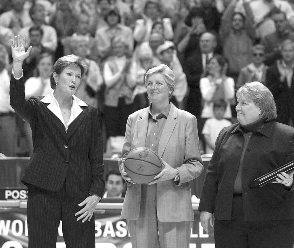 The NCAA s Sue Donohoe (center) and Division I Women s Basketball Committee chair Lynn Parkes (right) were on hand to