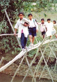 Let us meet some children and see how they reach school. Bamboo Bridge Try these Assam Collect some bricks.