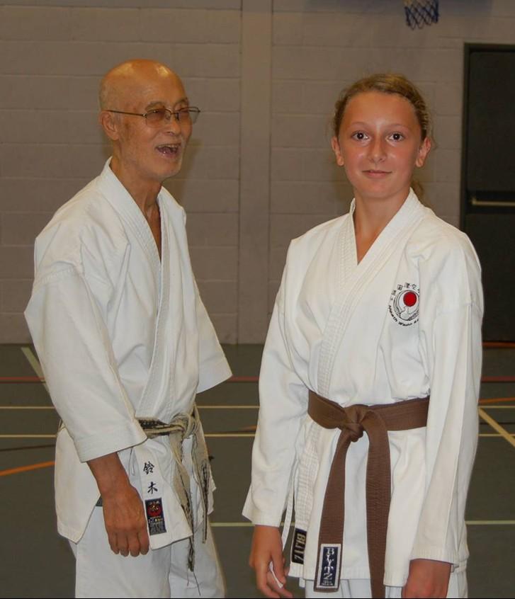 Katie Evans with Sensei, I hope he s not laughing at her karate.