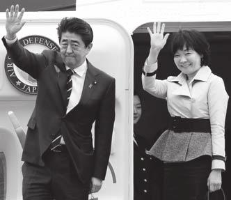 Before boarding his flight from Tokyo, Abe took the unusual step of pledging to clean up the mess in government when he gets back.