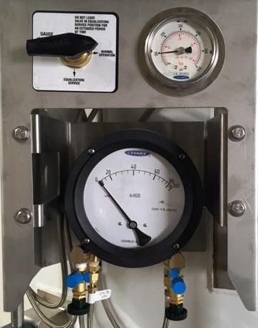 the gas phase of the vessel. This pressure gauge can also be isolated with the four-way valve.