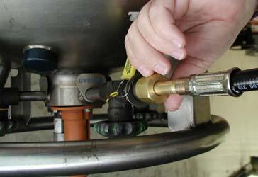 Connect the end of the pigtail with the CGA fitting to the Use valve mating fitting on the portable bulk vessel. Open the use valve (turn counter-clockwise to open).
