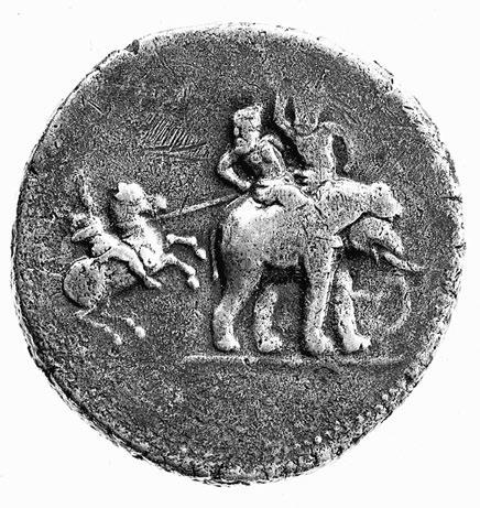 battle 419 Figure 13.3 Decadrachm minted in Babylon showing Alexander attacking Porus on an elephant.