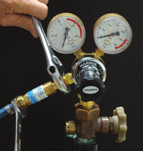3). 5. Adjust the oxygen regulator to allow a small flow through the hose then release the control. Repeat for the fuel gas regulator (this blows off dust and chalk from inside the hoses). (Fig 4.) 6.