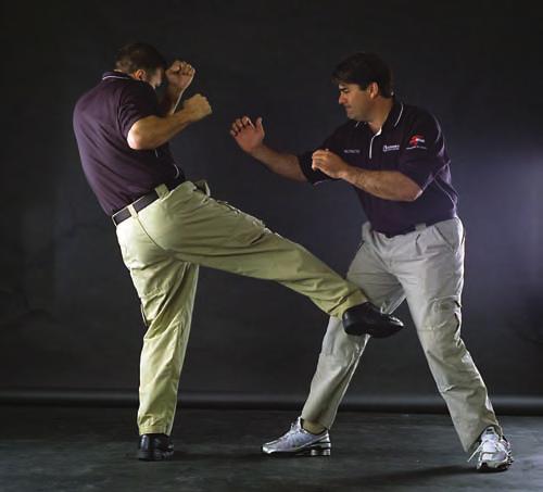 1 2 3 4 Dave Young (left) recommends using rapid-fire kicks (1-2) to maintain distance before closing the gap and striking with the hands (3) and elbows (4).