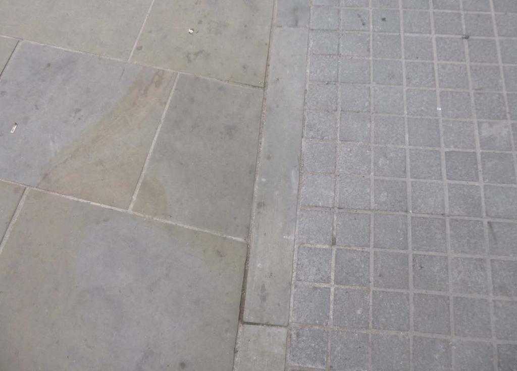 Pennant crossover stones with cast iron kerbs and