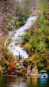 There are numerous waterfalls that flow into the lake. It is nestled in the mountains in Oconee County about 1 ½ hours from Spartanburg up Highway 11.
