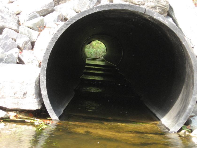 the baffles in the culvert after the retrofit, and Figure