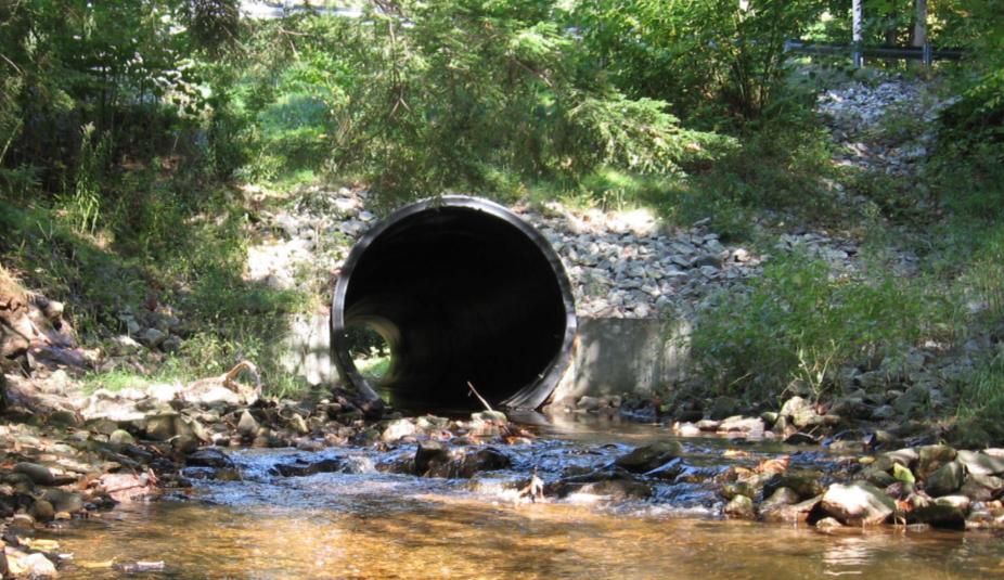 Figure 3-14: Outlet of Falmouth, Maine slip lined culvert retrofit. Rock tailwater grade control also shown.