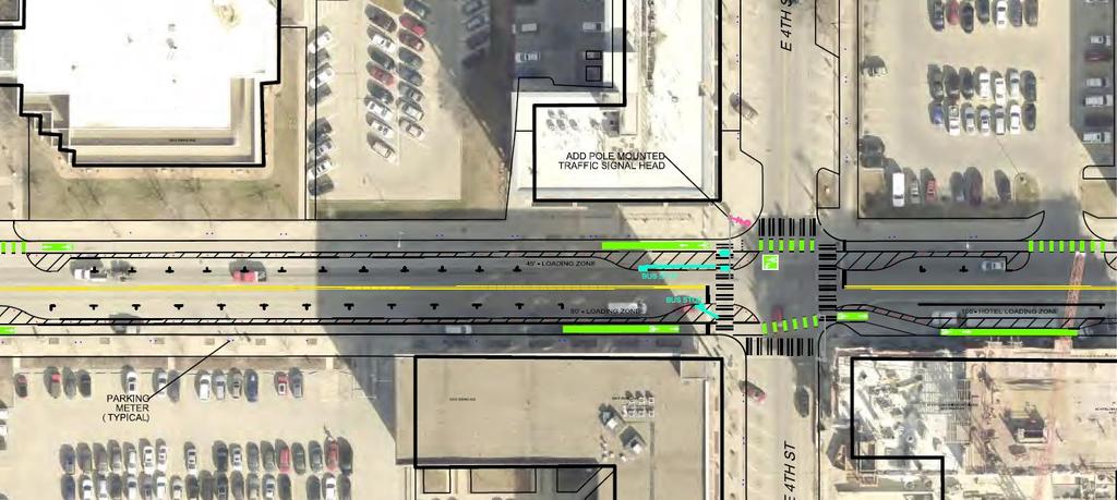 E Grand Complete Street Pilot Project Design Elements Two travel lanes Parking protected bike lanes / Green Conflict