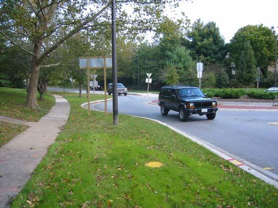 This single lane, 3-leg, suburban roundabout was chosen because it has light fixtures placed in close approximation to the French Roundabout Lighting Guide as shown in Figure 3.
