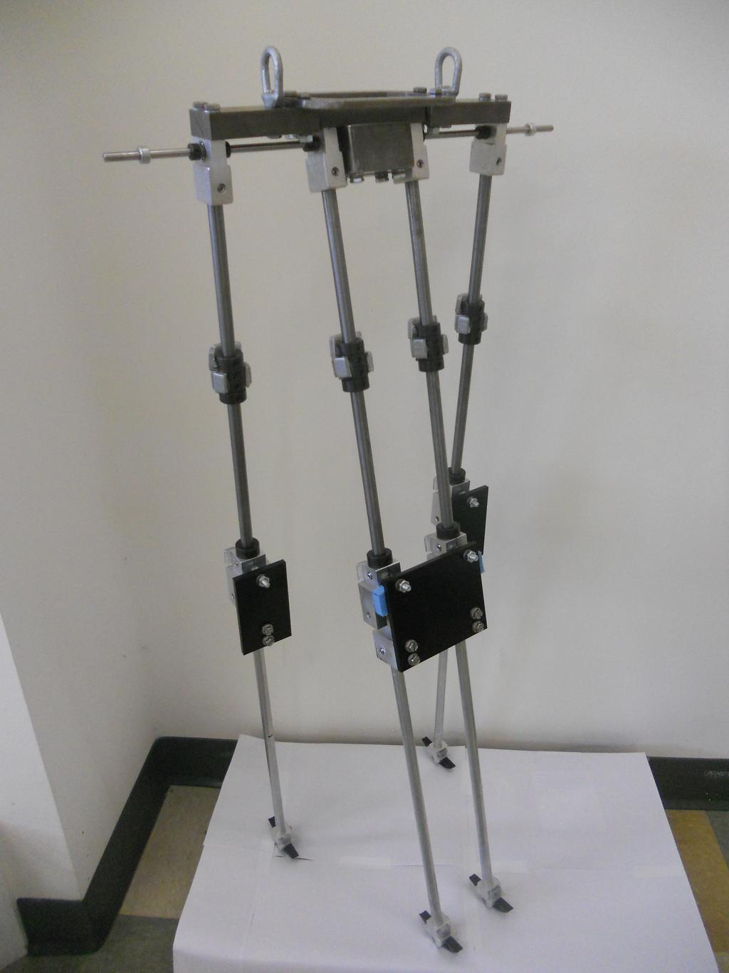 Figure 4.13: The picture of the physical walker. This is taken from [10] seen in Figure 4.14. In the Solid Works model, different parts of the leg were coupled to create four large parts.