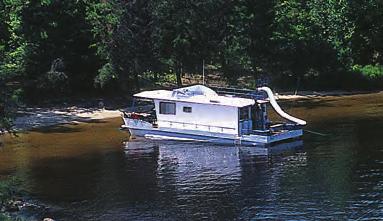 OUR NORTHERN LIGHTS HOUSEBOATS FEATURE: Sunroofs and wrap around decks, and the quiet operation of LP gas to stove/oven, refrigerator/freezer, lights, water heater, and cabin heaters.
