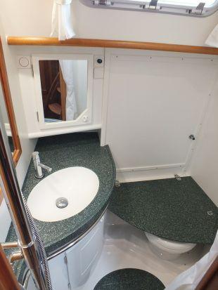 Separate shower compartment Starboard aft cabin Double berth Cupboards and