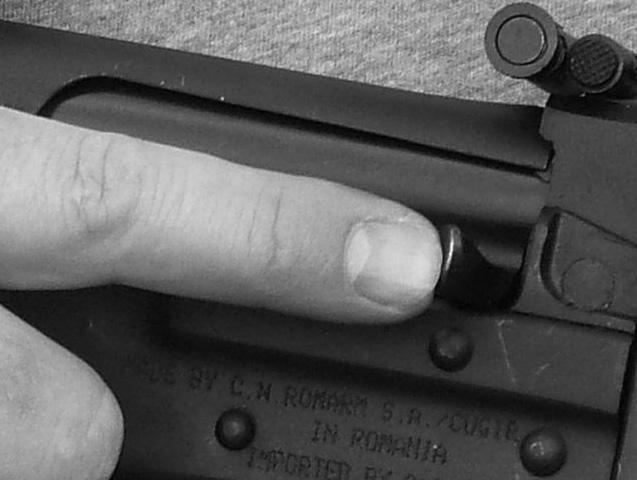 Pull on the magazine slightly in order to ensure that it is locked into position.