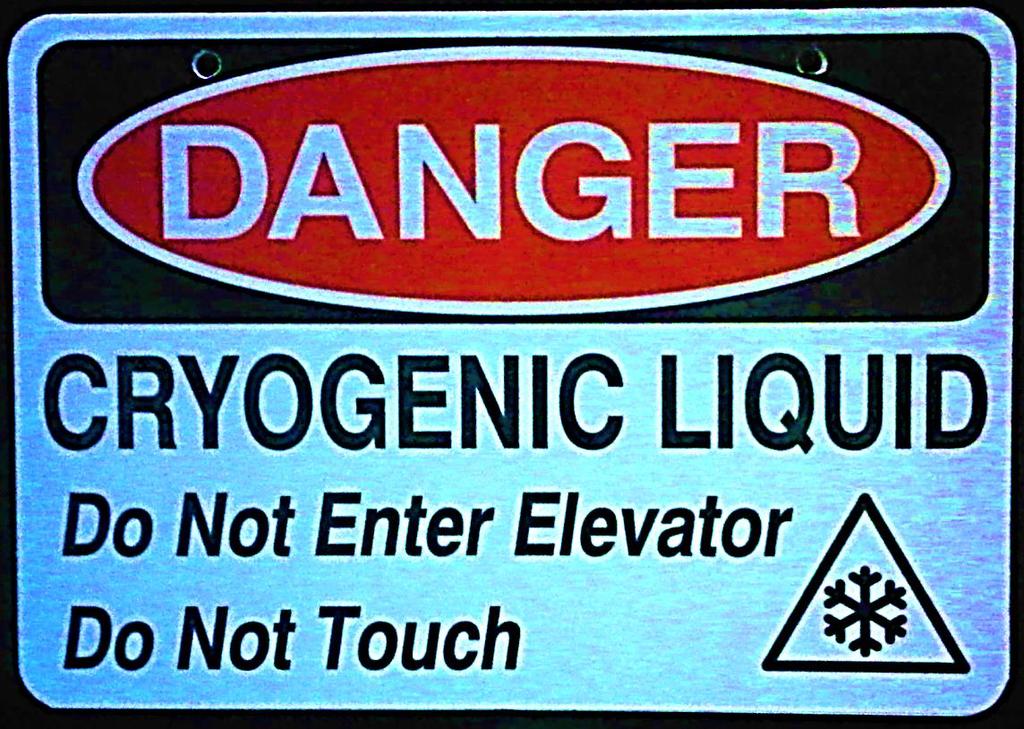 Figure 3a. Elevator Warning Sign Figure 3b.