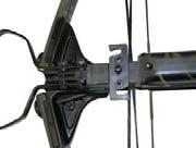 ) Place both hands on the string at each side of the crossbow body no more than ½ inch from crossbow body. 3.