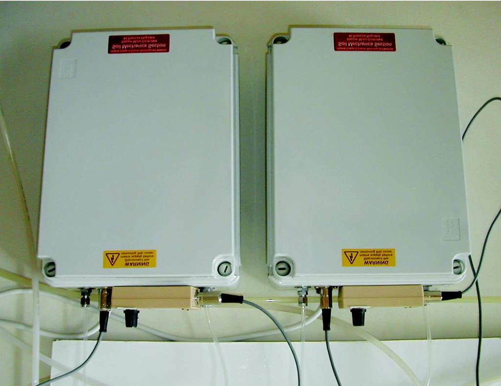 The Handbook of Geo-pressure-vacuum panel Figure 2.3: Imperial stepper motors controlling cell (right) and pore (left) pressure (external view). 2.1 Air pressure distribution line (WF Mod.No.