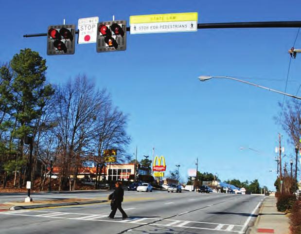 SAFE CROSSING TREATMENT OPTIONS Red-light treatments Red light crossings use traffic signals or HAWK beacons to stop drivers before pedestrians get a walk signal.