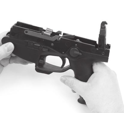 upper receiver and rotate the lower receiver up into the upper receiver until