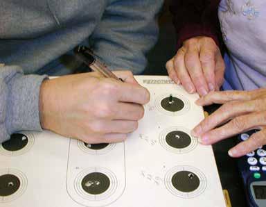 Correct manual scoring of paper targets calls for two scorers to work together and use scoring gauges make decisions on close shots. 3. Electronic Scoring Targets (EST).