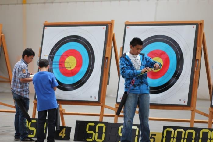 CHAPTER 8 Example League Game Schedule Home team sets up the archery range and prepares for the game o 4 targets setup with target numbers and flip boards o Score cards printed out and