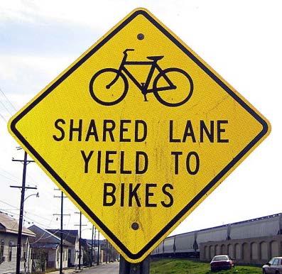 presence of bicyclists and to inform them to pass bicyclists safely?
