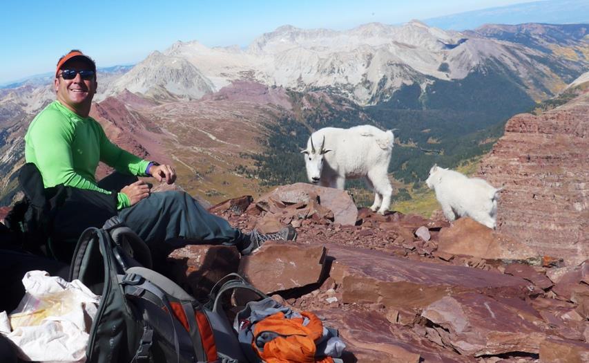 Would you believe our goat friends summited with us?? And one of them is a baby. They are amazing climbers they make it look effortless. Dean wanted this shot for his kids.