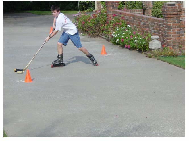 Since we are ice time constrained here in Texas, an effective drill is to have the player use rollerblades and a street hockey puck to navigate an obstacle course.