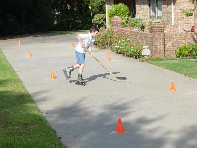 A ball is a substitute if the surface is too rough, but the puck really makes the player learn to control their stick and the puck.