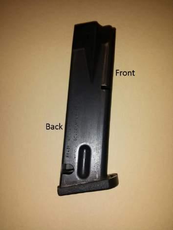 Figure 2-13. Properly assembled slide, barrel, recoil spring, and guide rod. e. Insert the end of the recoil spring and the recoil spring guide into the recoil spring housing.