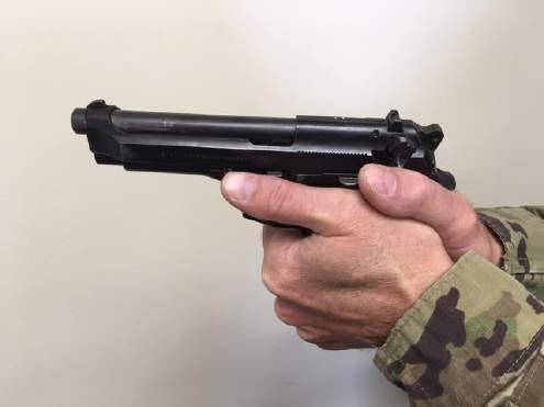 Figure 2-5. Regrip pistol and prepare to fire. Optional procedure for loading with the slide forward a. Keep pistol pointed in a safe direction. b.