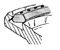 1. Place the outer edge of the seal into the clapper groove as shown. See figure below. 2. Using a blunt screwdriver, force the inside lower edge of the seal into the clapper groove. See figure below. 4.