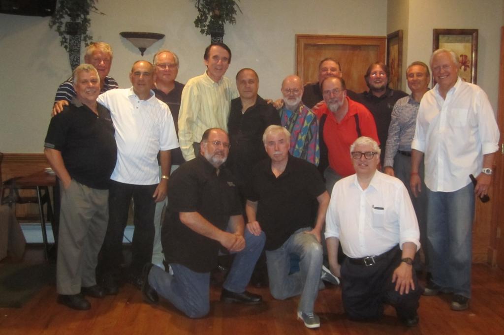 A partial group of attendees pose: (Standing L to R) Paul Kircher, Danny Brew, Rich Bringoli, Paul Philips, Larry Egan, Tom Abarno,