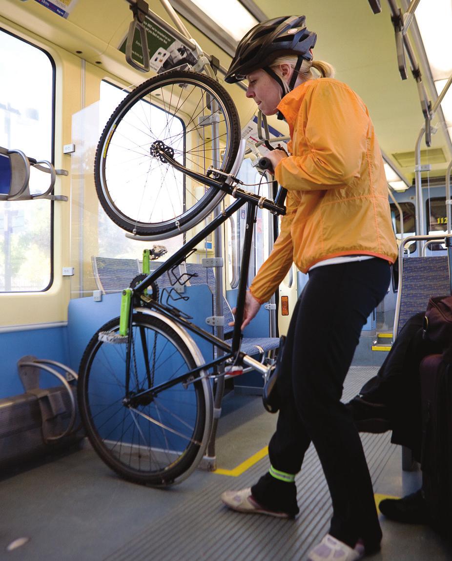 CONNECTING WITH TRANSIT Position the rear wheel between the hoops of the lower rack and hook the front wheel at the top. Remove any unsecured items and collapse your seat post if possible.
