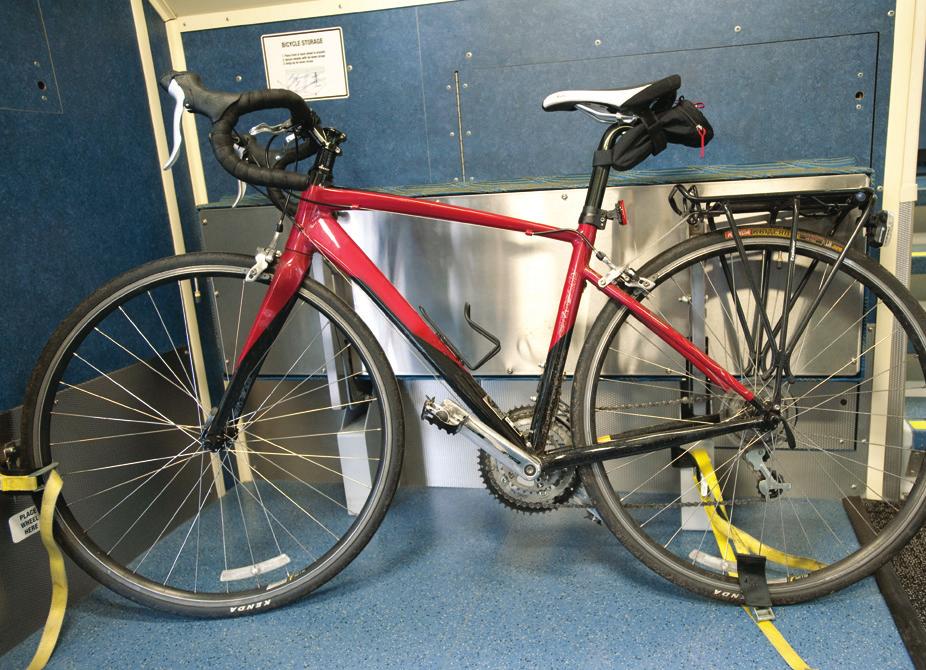 As you approach your stop, prepare to remove your bicycle from the rack.