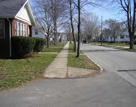 These sidewalks present trip hazards and may be impassible for wheelchair users.